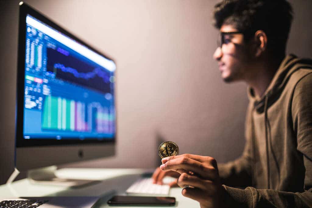 Indian bitcoin trader checking stock trading data analysis concept working in office with financial graph on computer monitors indian bitcoin trader checking stock trading data analysis concept working office with financial graph computer monitors 1